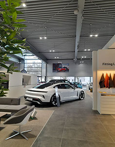 Porsche showroom with a Taycan